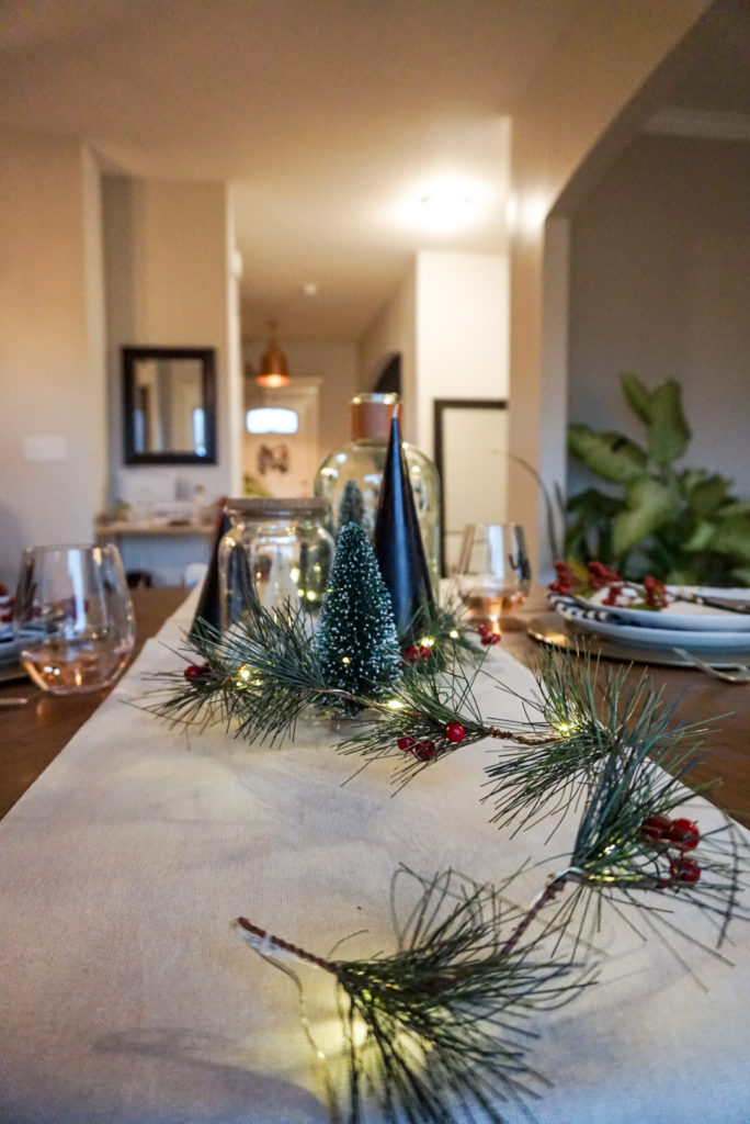 christmas centerpiece with garland and bottle brush trees
