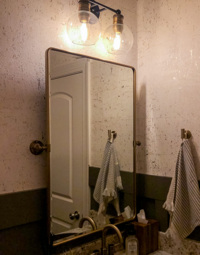 Bathroom mirror and sconce